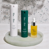 The lilac + flint Glow Trio Calm Control featuring Supple Cleanser, Nourish Moisturizer and Glow Oil for calm, balanced skin.